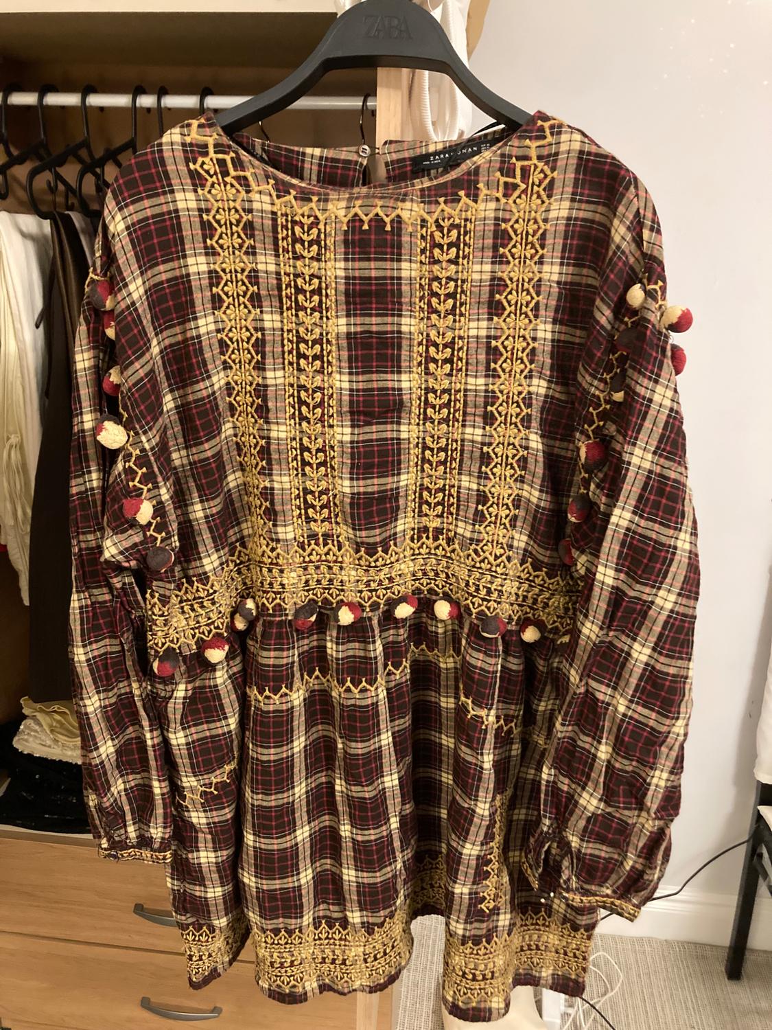 CHECKED DRESS WITH POMPOMS