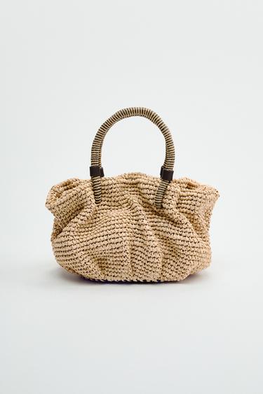 MINI SACA TRENZADA - Beige claro de Zara