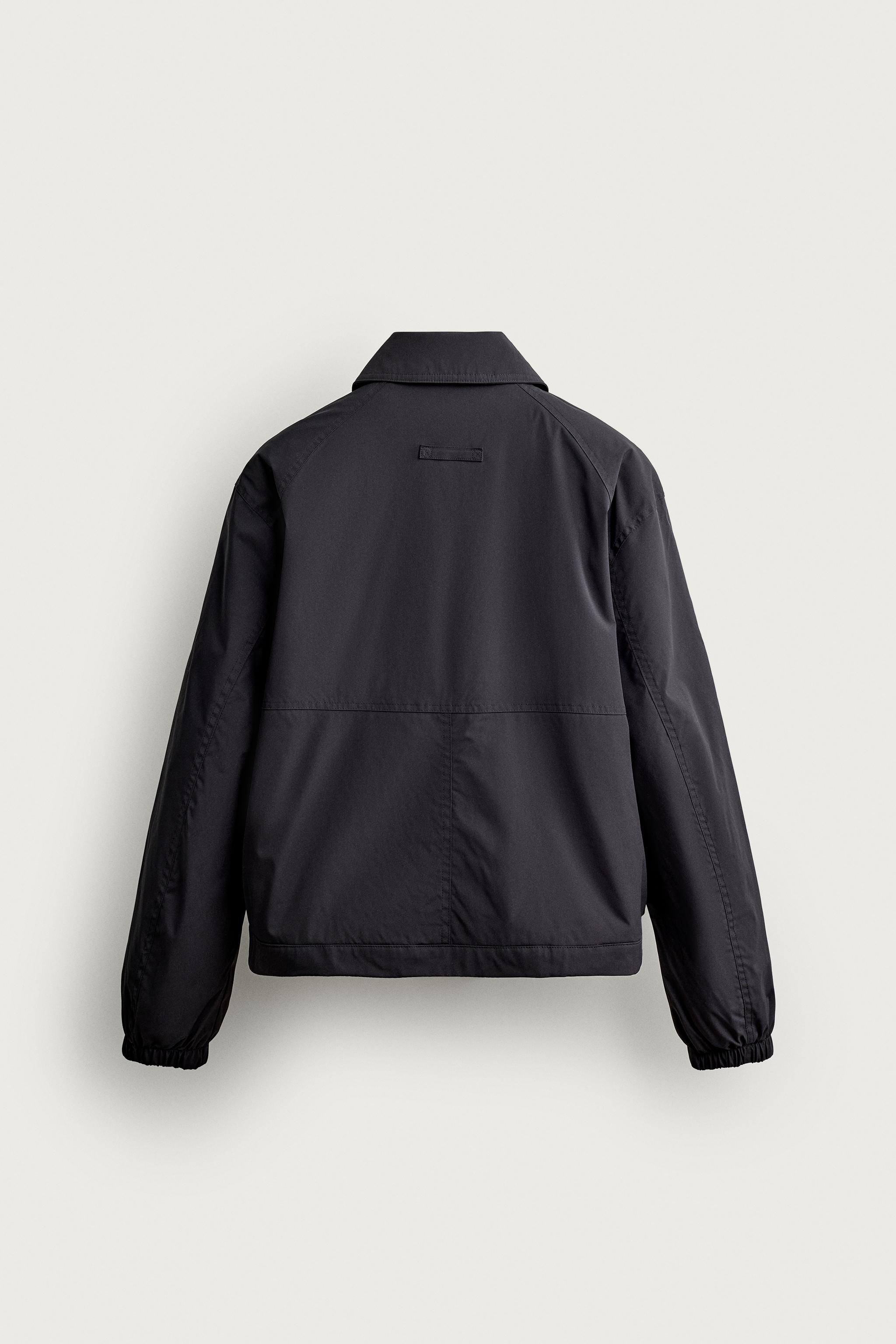 WATER-REPELLENT TECHNICAL JACKET — Black