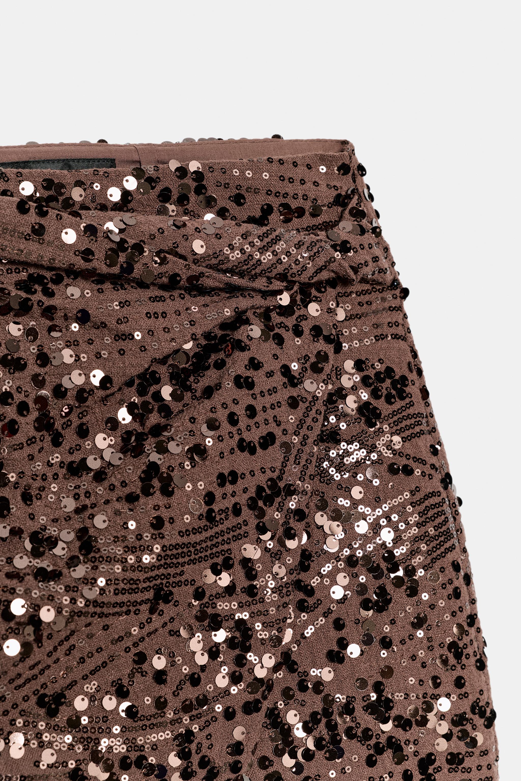 JUPE-PANTALON MINI À PAILLETTES ET NŒUD