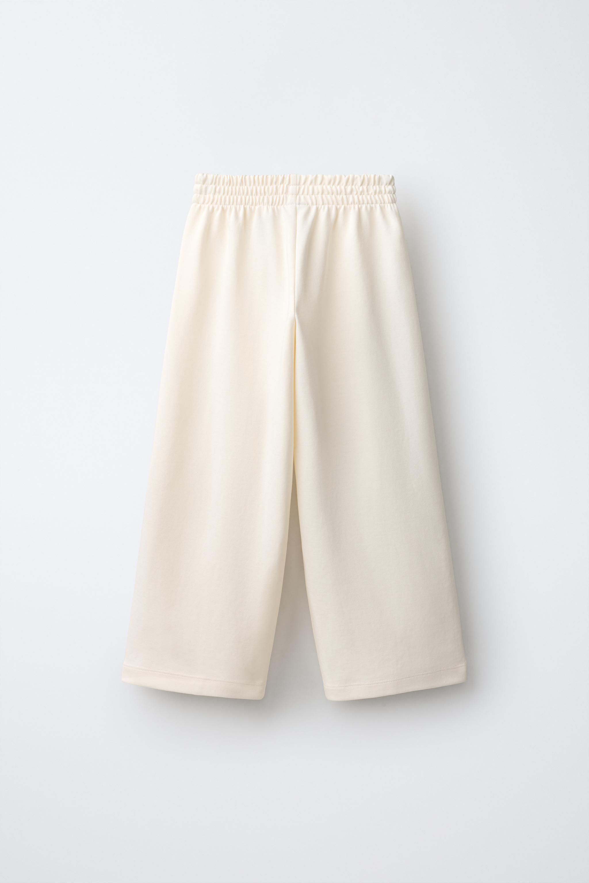 INTERLOCK WIDE LEG PANTS — Ecru