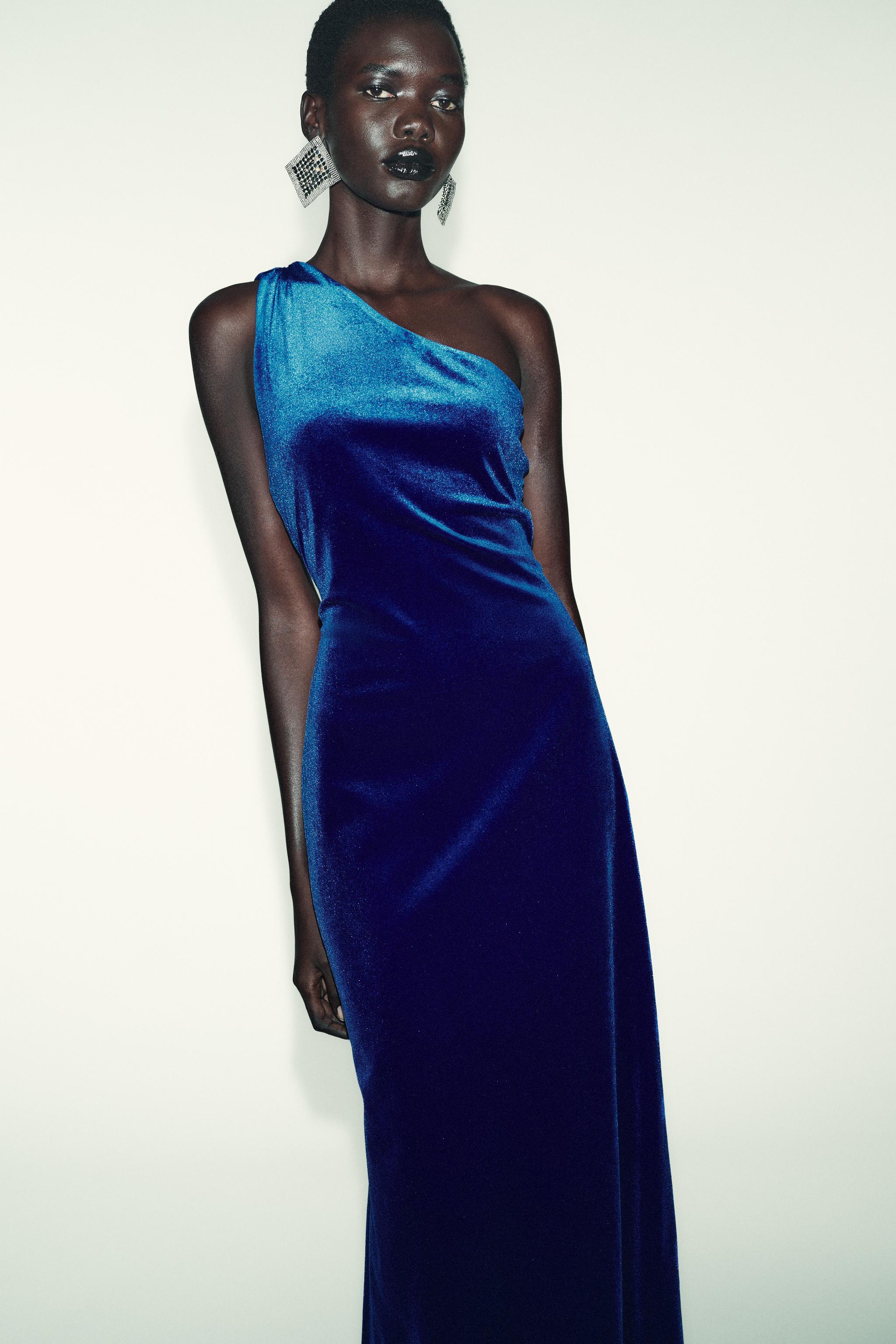 velvet blue dress zara Four fabulous New Years Eve looks, all from , Look 1: This navy with a plunging neckline is so chic. I love the gold detailing, and the fit is absolutely impeccable it Zara | Dresses | Zara