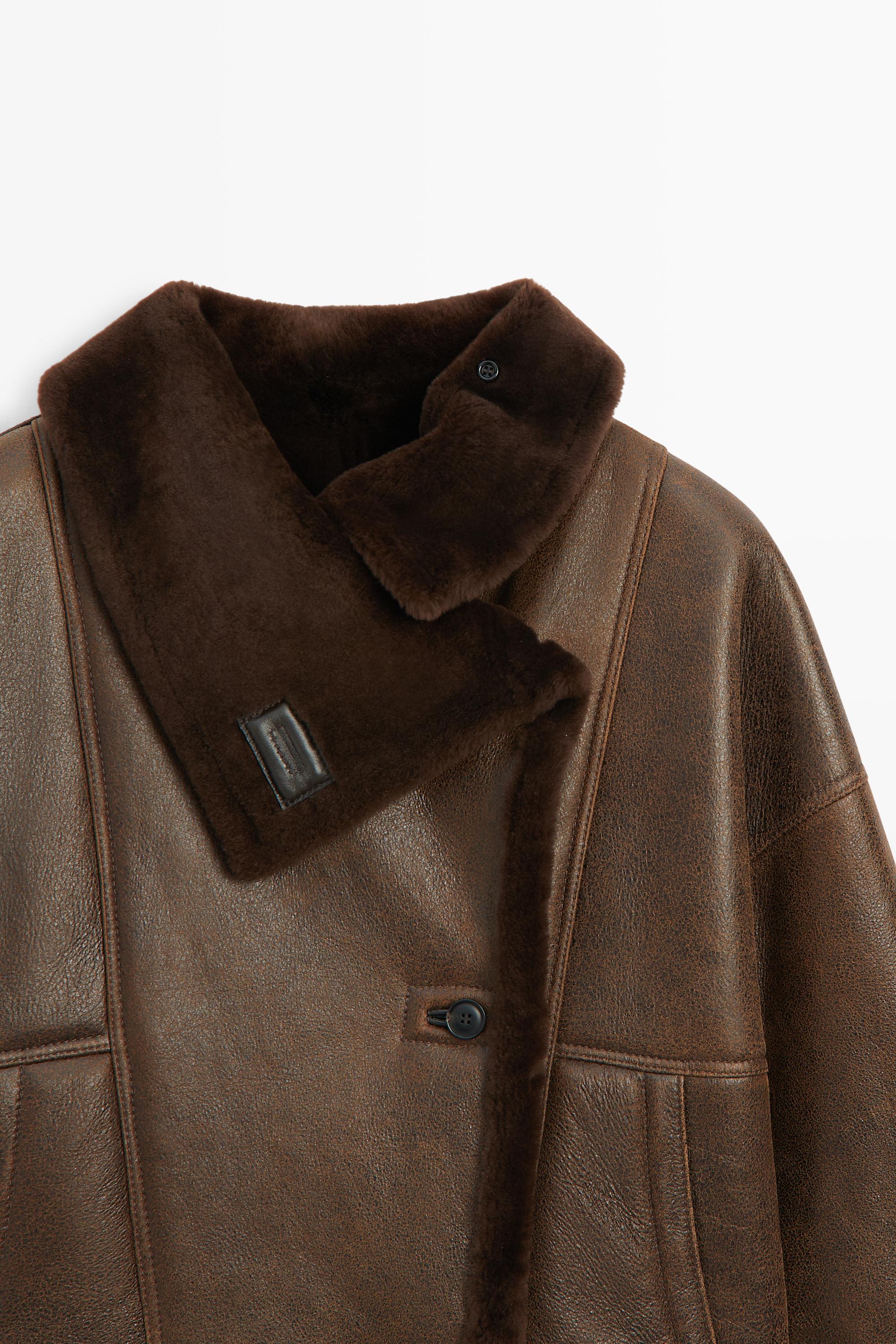 Manteau double face en cuir, daim et fourrure