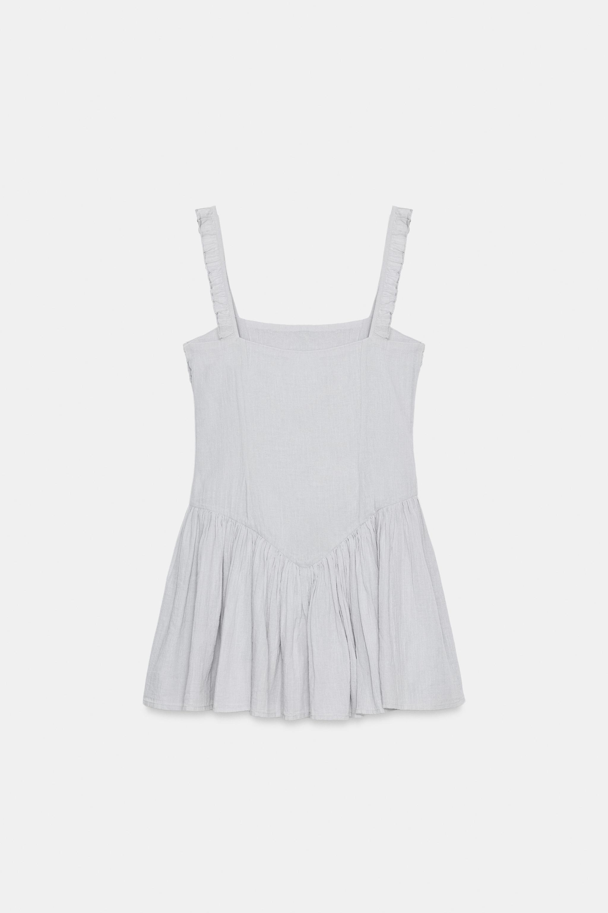 ROBE COURTE BRODERIES VOLUME