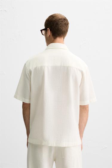 CHEMISE POLO JACQUARD À CARREAUX - Blanc cassé de Zara - Image 2