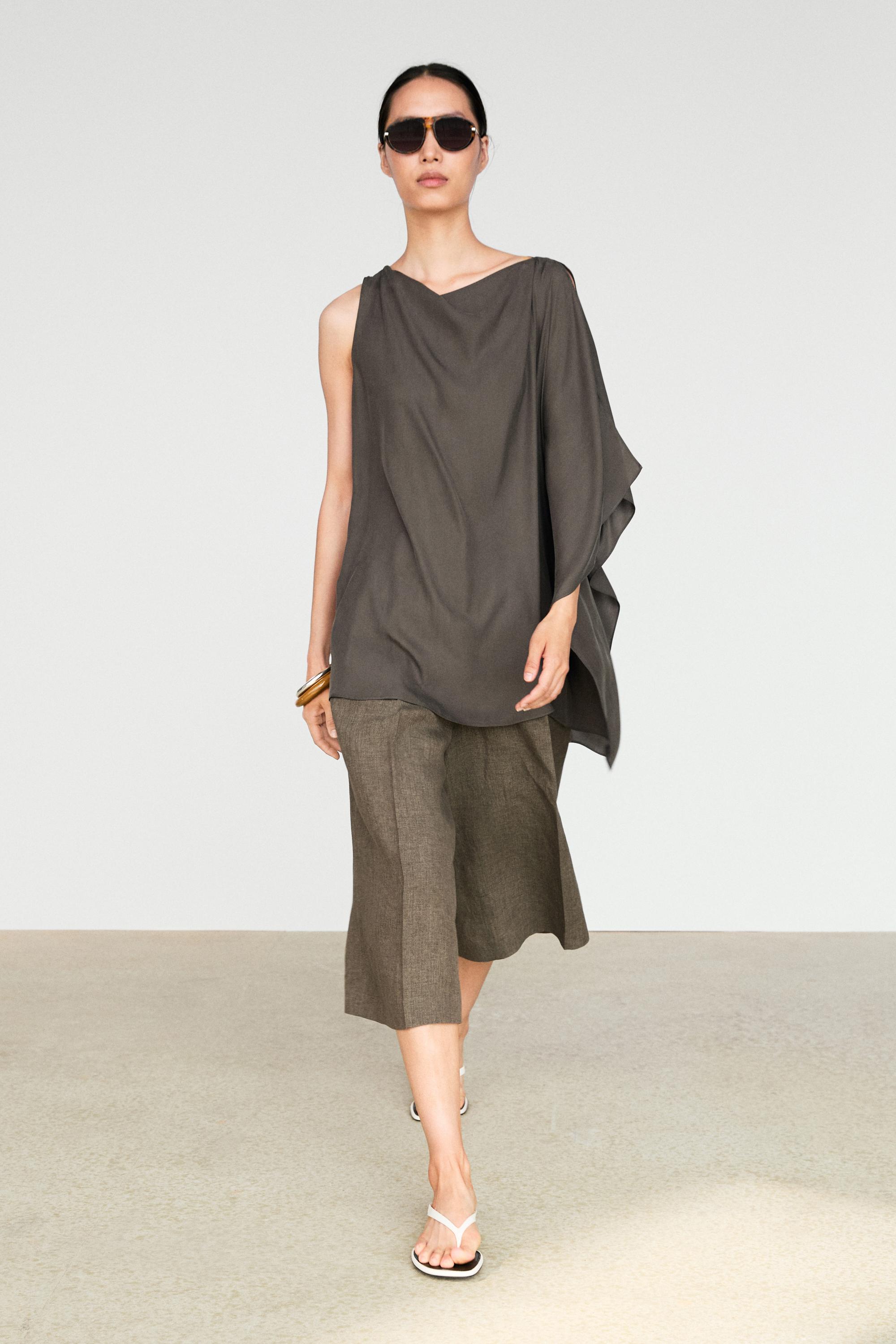 Asymmetric flowing cape top