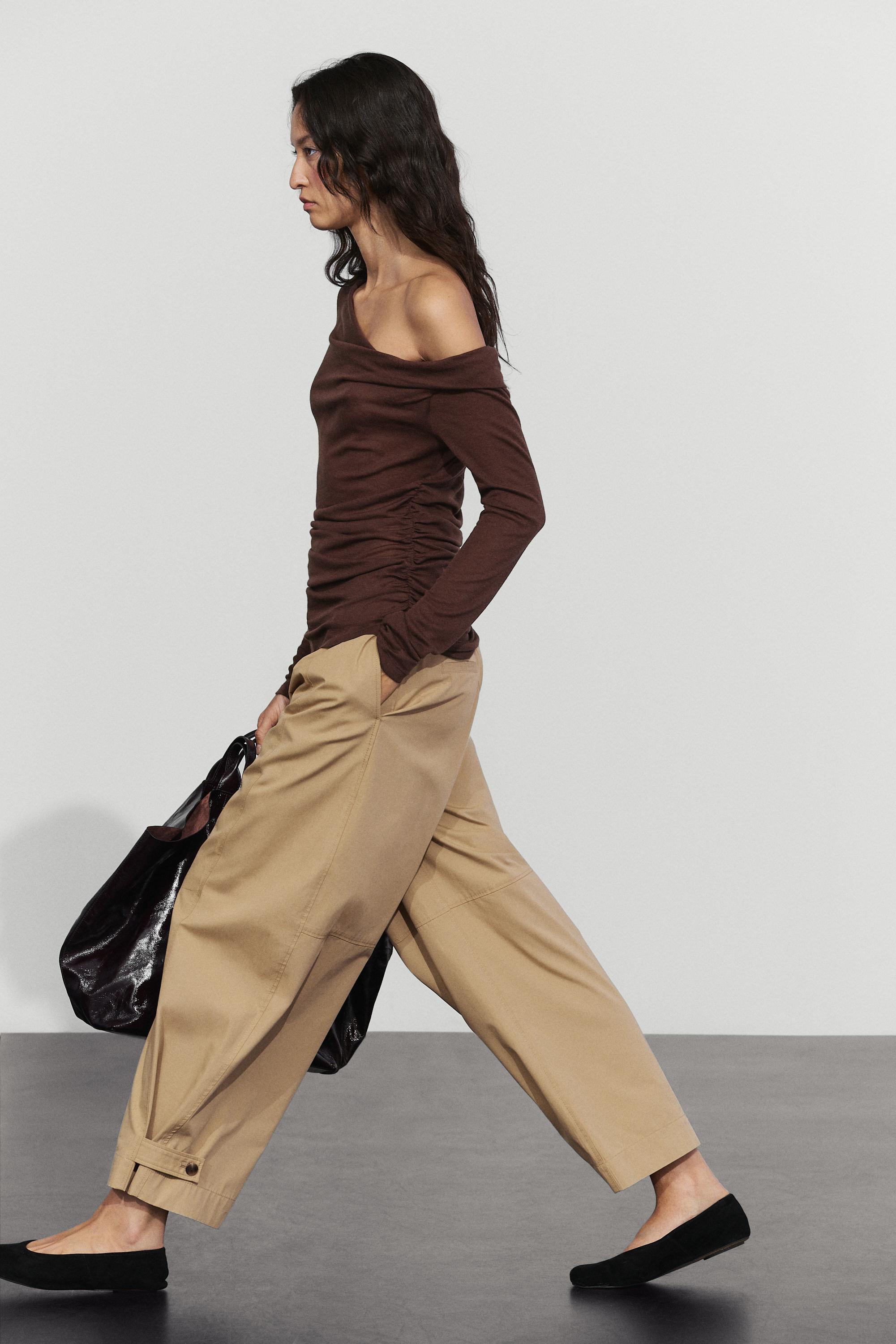 Asymmetric long sleeve flowing top