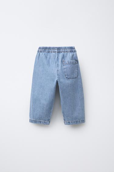 JEANS BAGGY بخياطات - أزرق فاتح الخاص بـ Zara