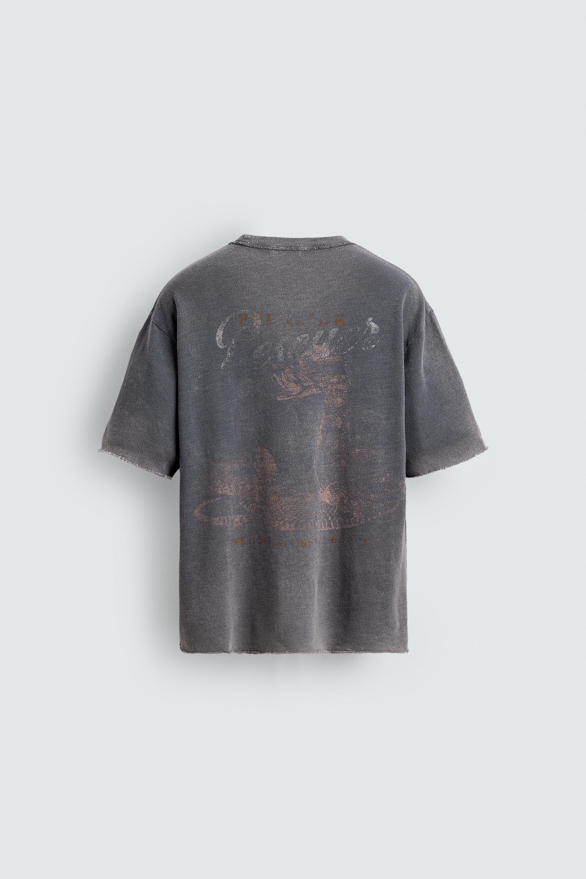 T-SHIRT EN MAILLE RELAXED FIT DÉLAVÉ