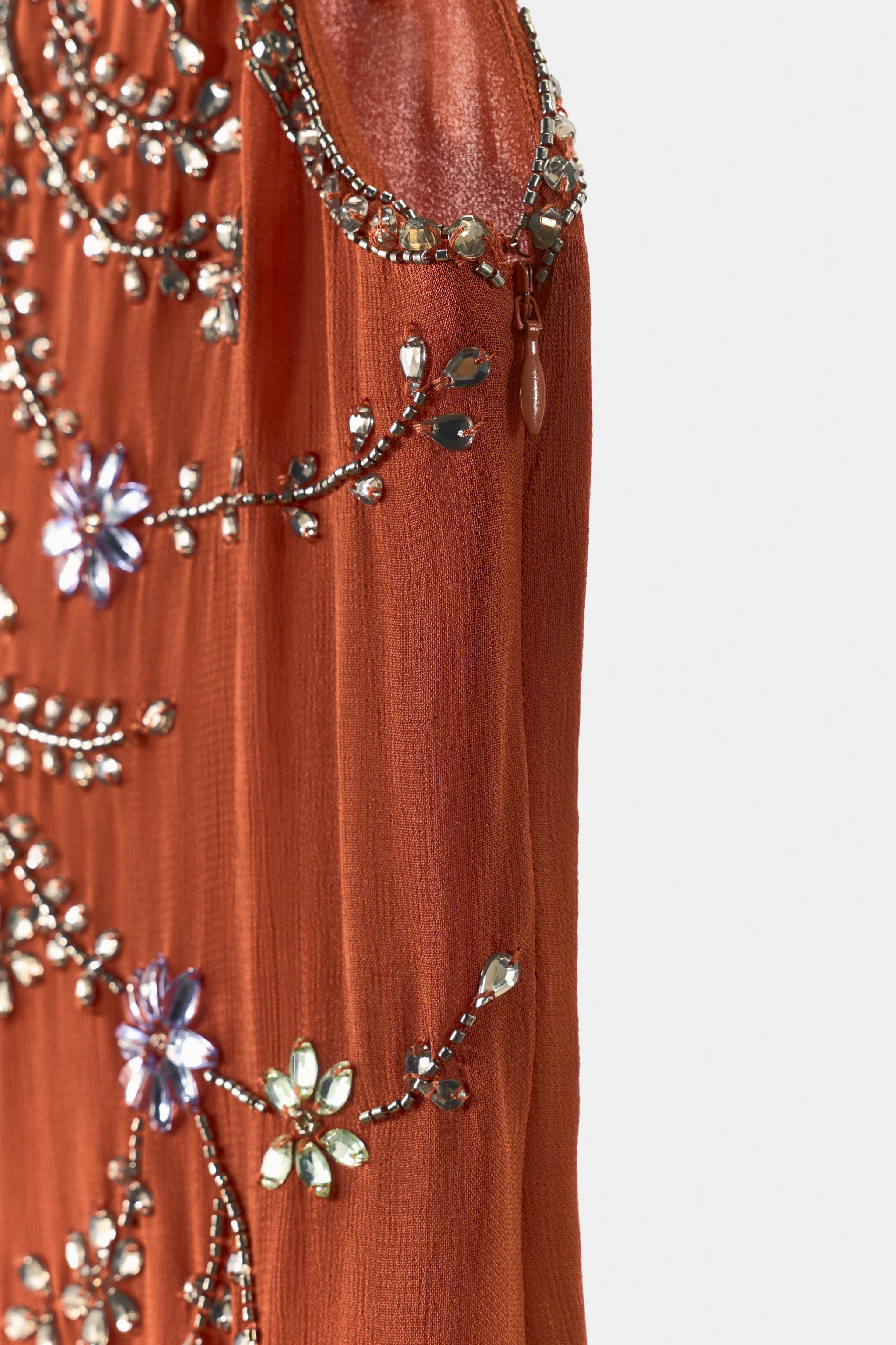 ROBE MIDI AVEC FANTAISIE ET FRANGES