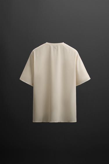 T-SHIRT STRUCTURE AJOURÉE - Écru de Zara - Image 1