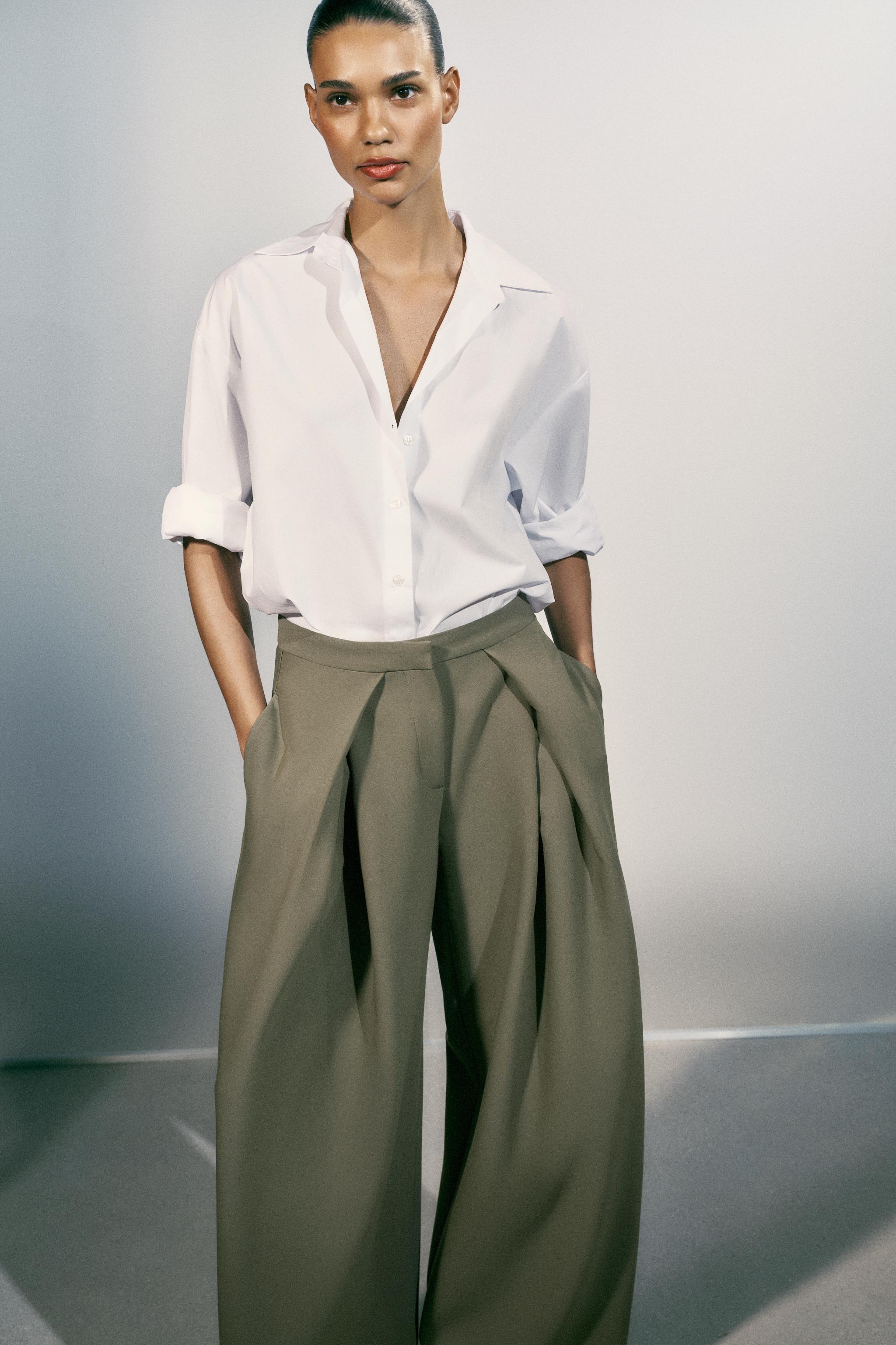 PANTALON LARGE À PLIS