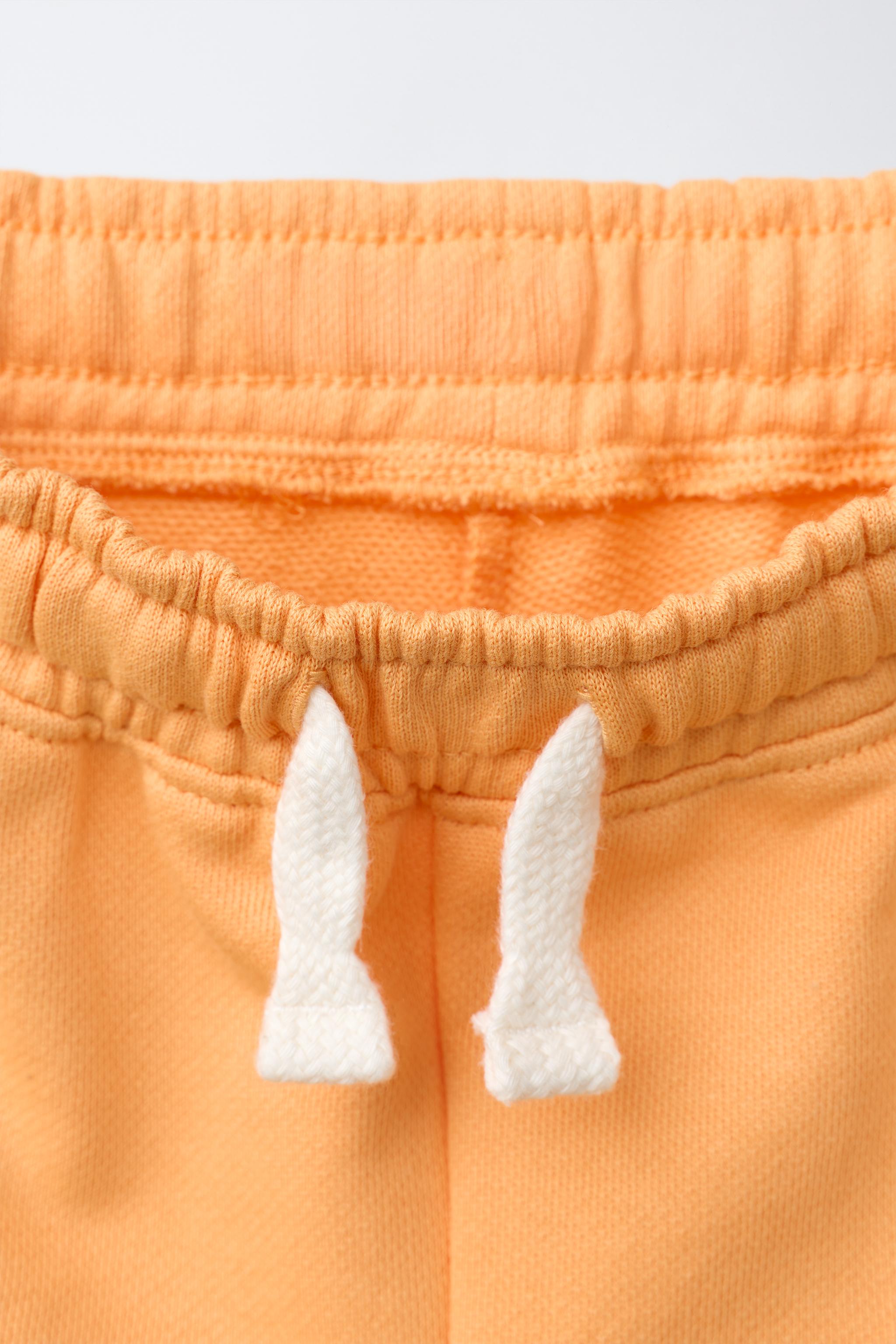 SHORT DE JOGGING NUMÉROTÉ