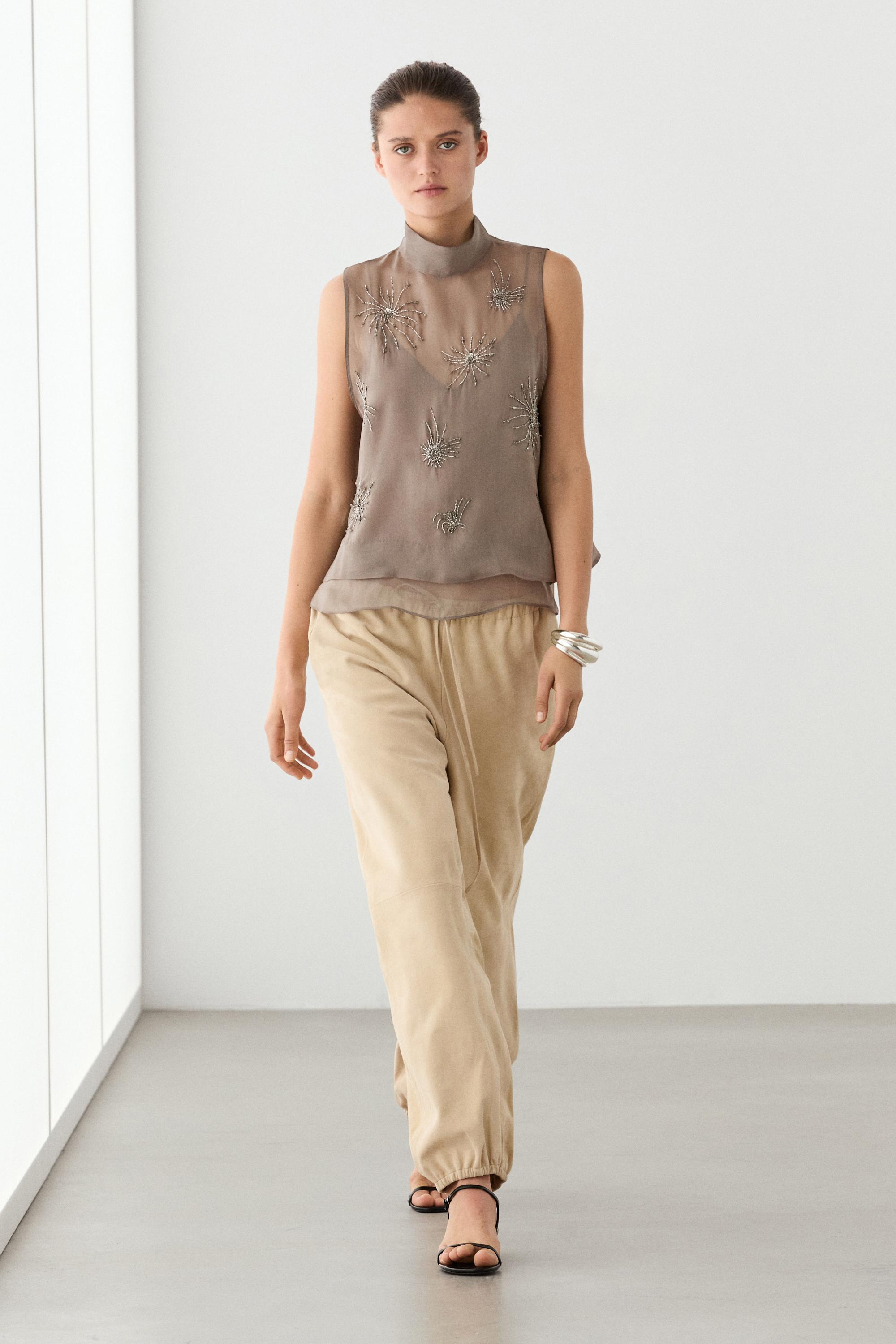 Semi-sheer top with embroidered detail
