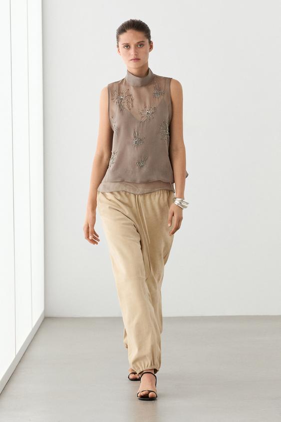 Semi-sheer top with embroidered detail from Zara - $160