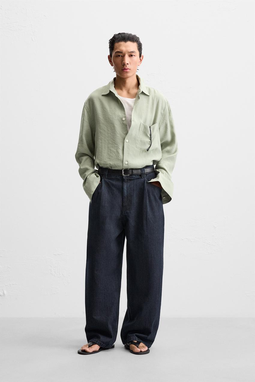 PLEATED WIDE-LEG JEANS