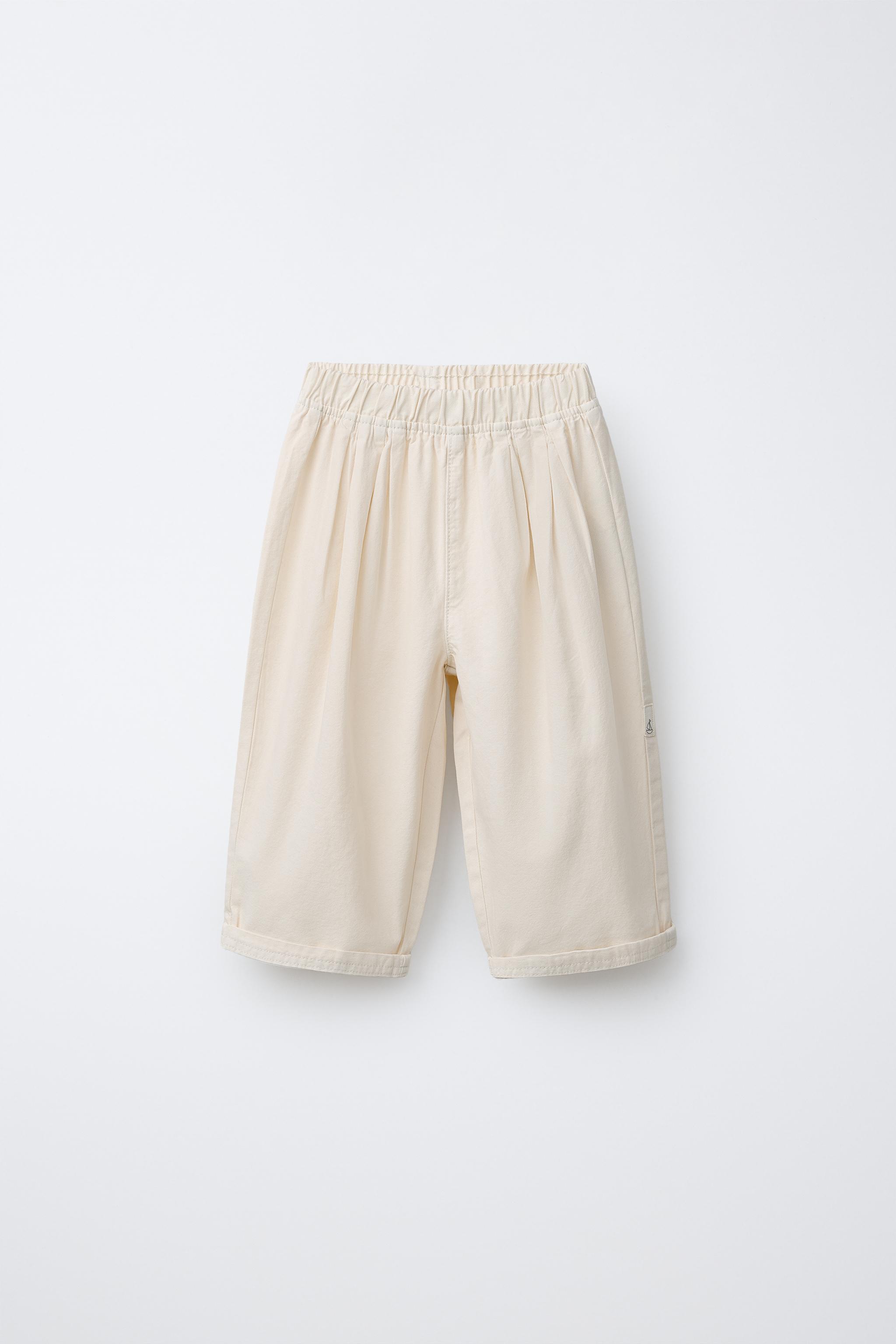 PANTALON BALLON EN TOILE AVEC ÉTIQUETTE
