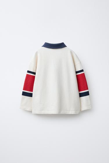 POLO ME VIJA DHE ETIKETË - Natyrale/e kuqe nga Zara