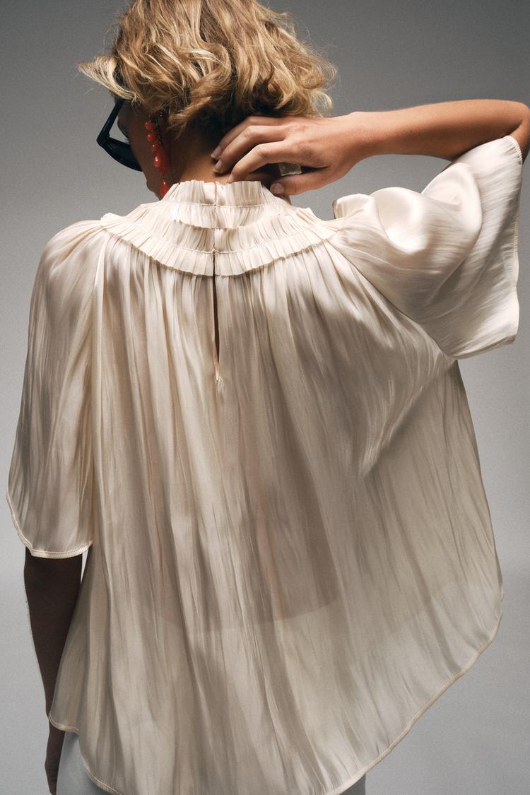 Blusa con efecto brillo 3