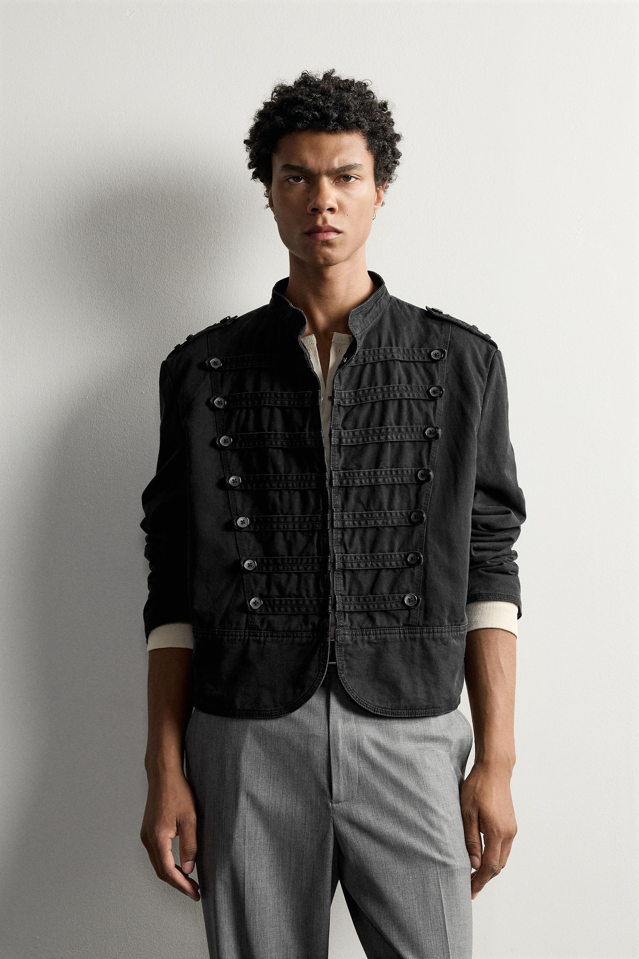 VESTE COURTE À ÉPAULETTES