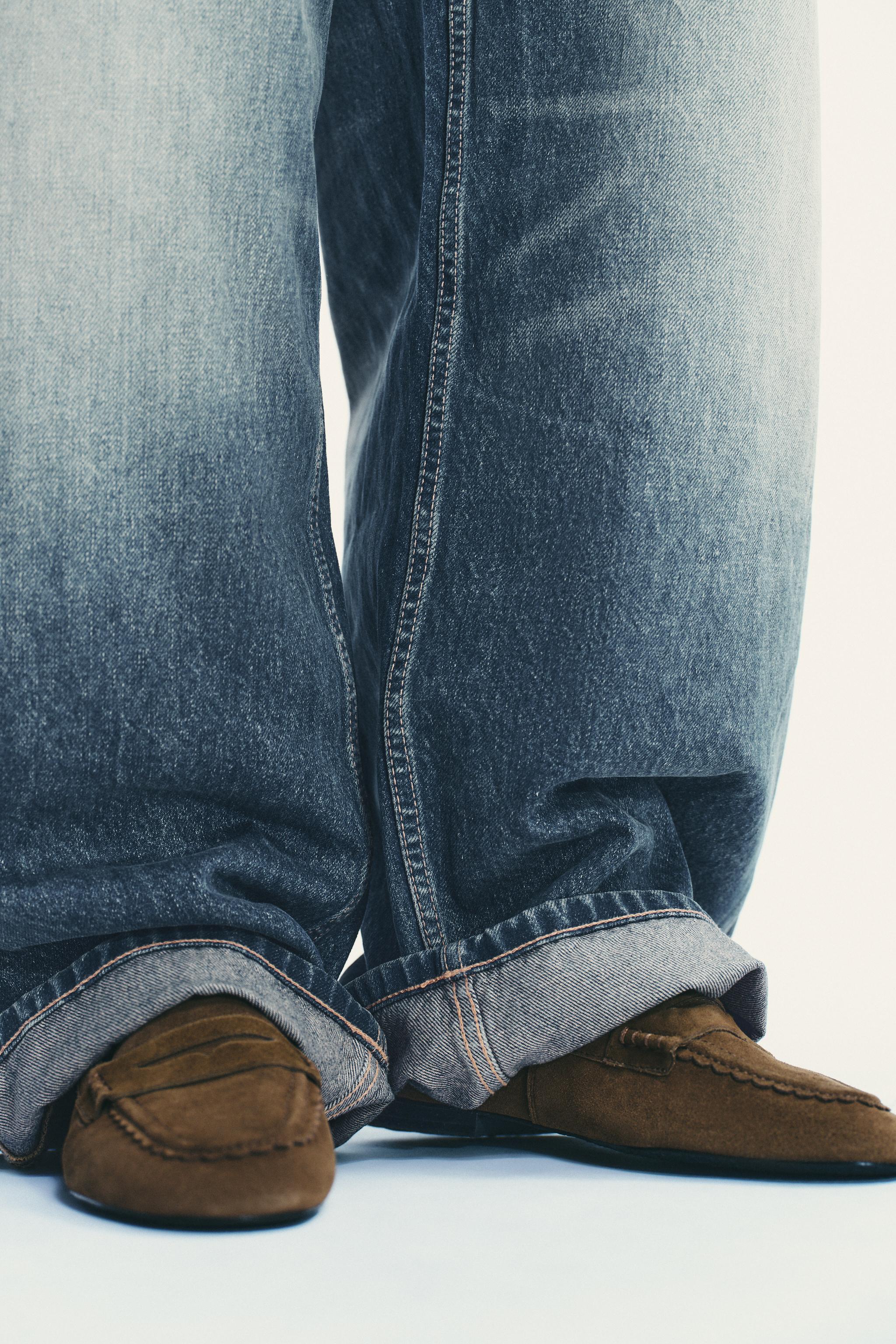 MOCASSINS EN DAIM AVEC SURPIQÛRE