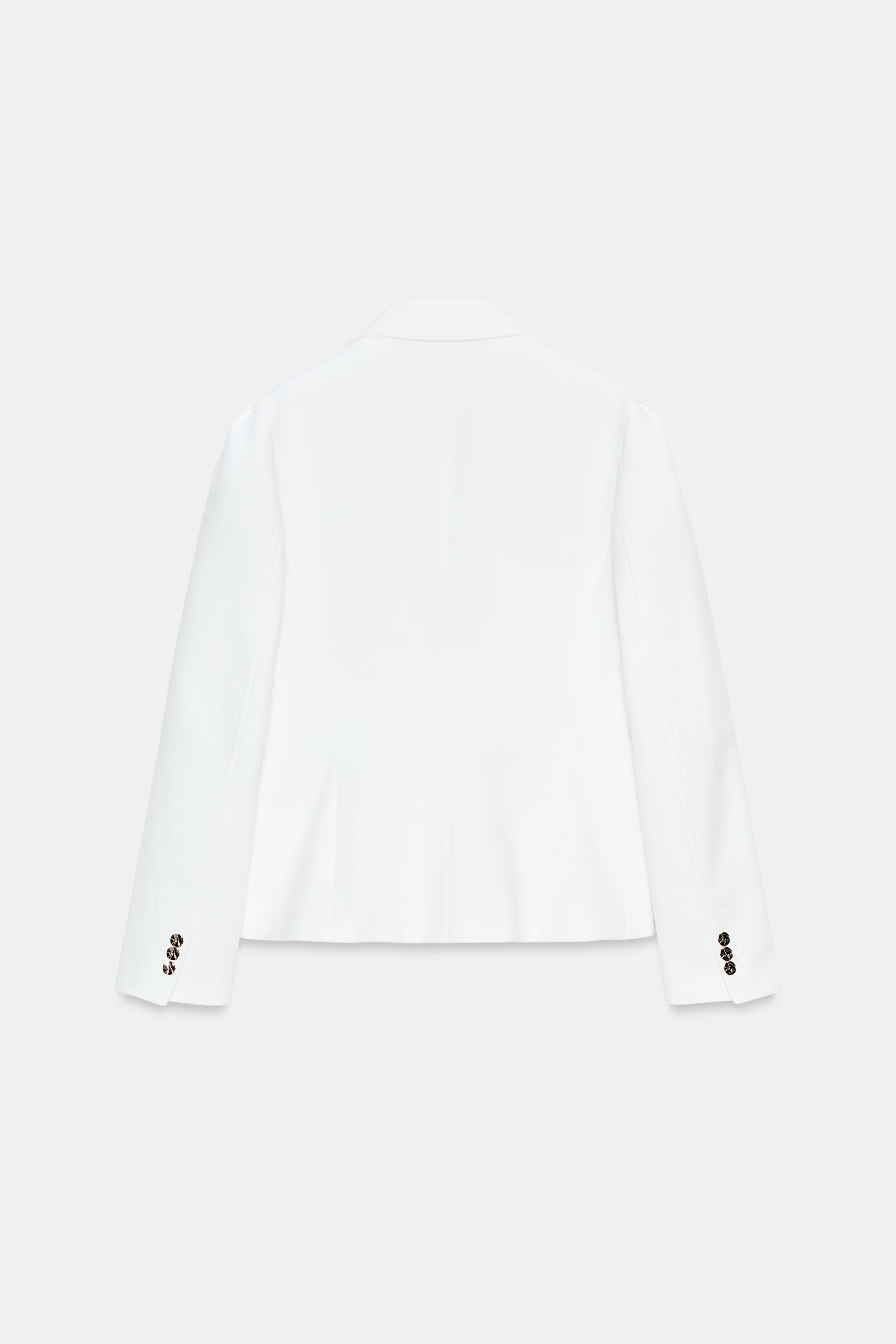 VESTE AJUSTÉE ÉPAULES MARQUÉES