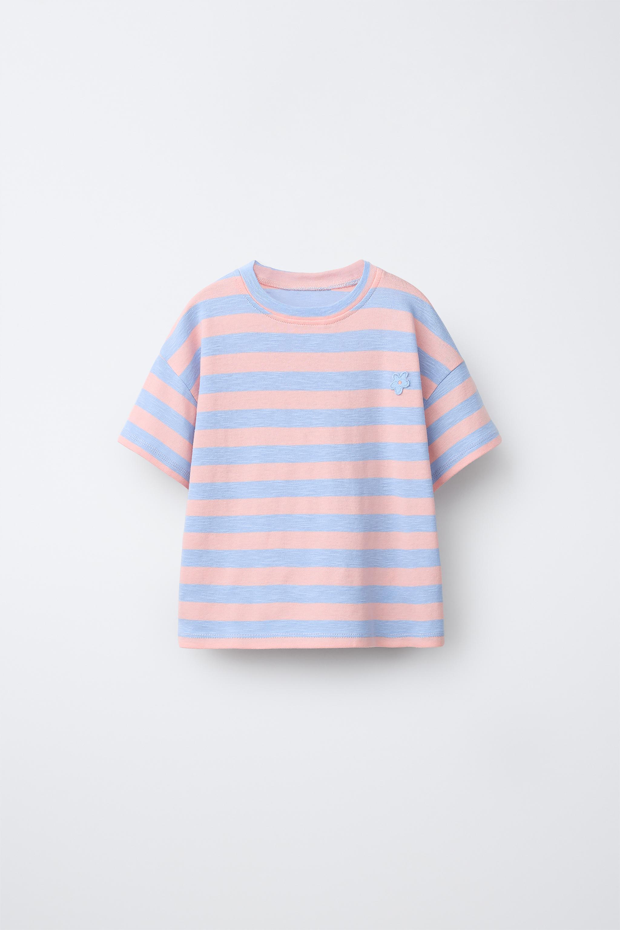 T-SHIRT À RAYURES AVEC PIÈCE FLEURIE