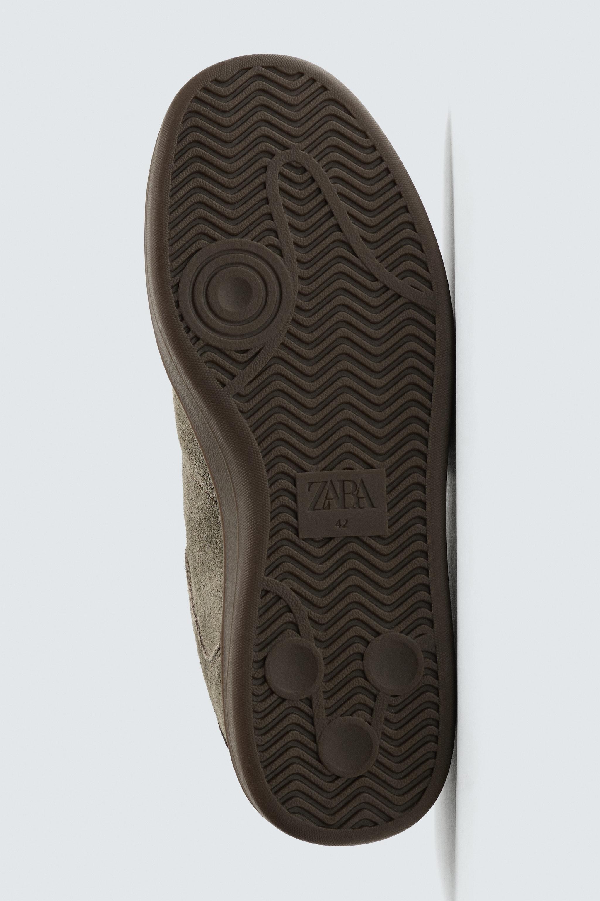 BASKETS EN CUIR
