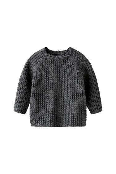 CABLE-KNIT SWEATER