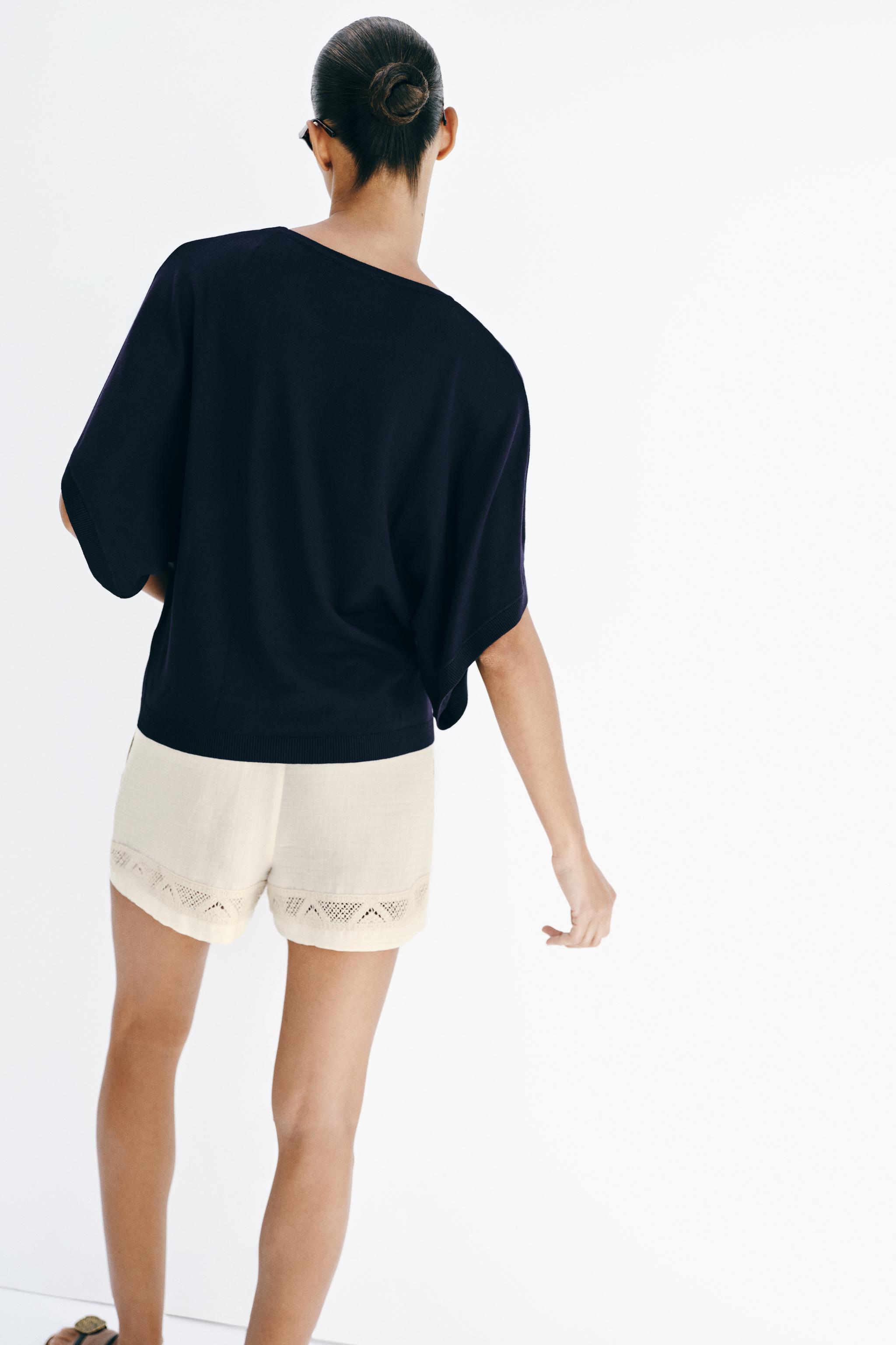 TOP EN MAILLE MANCHES AMPLES