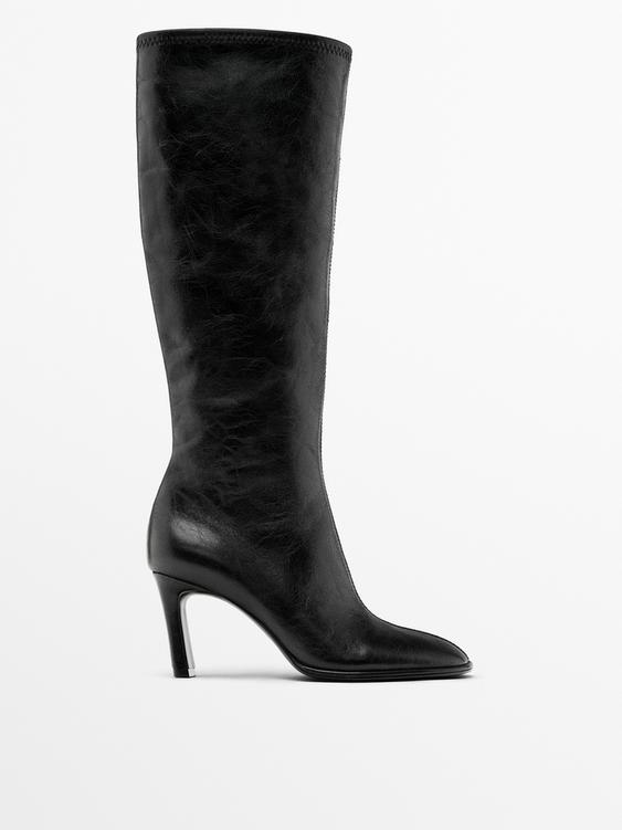 High-heel boots with elastic gores on the leg