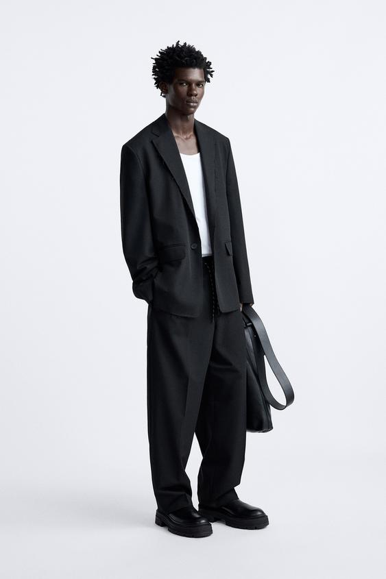 SUIT TROUSERS WITH IRREGULAR TRIMS - Black | ZARA Australia