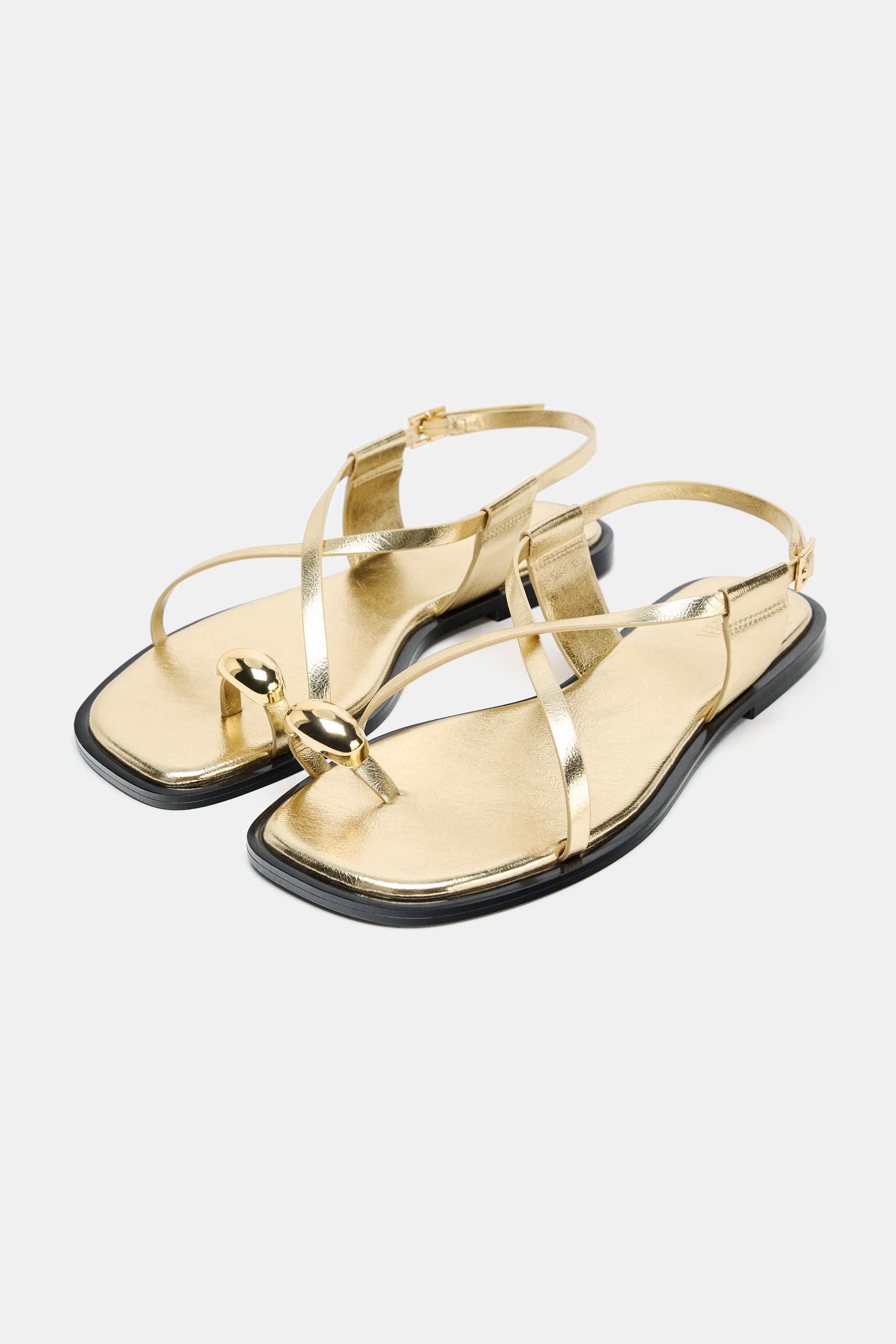 FLAT SANDALS WITH METALLIC DETAIL STRAPS