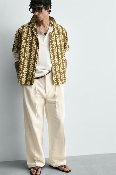 PANTALON À PLIS EN COTON ET LIN - Écru de Zara - Image 5