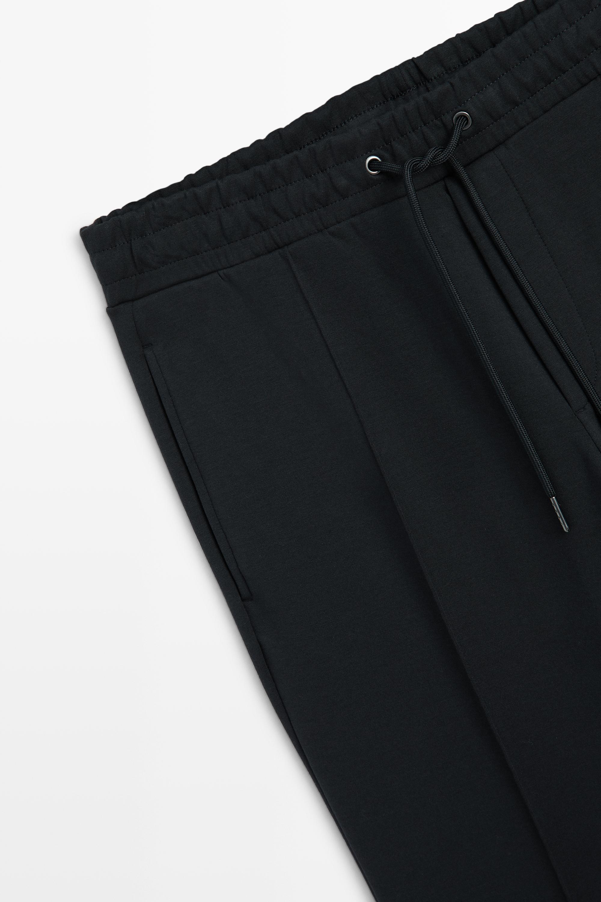 Pantalon à détails de coutures, total look
