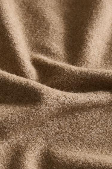 MANTA DECORATIVA FLECOS - Beige de Zara