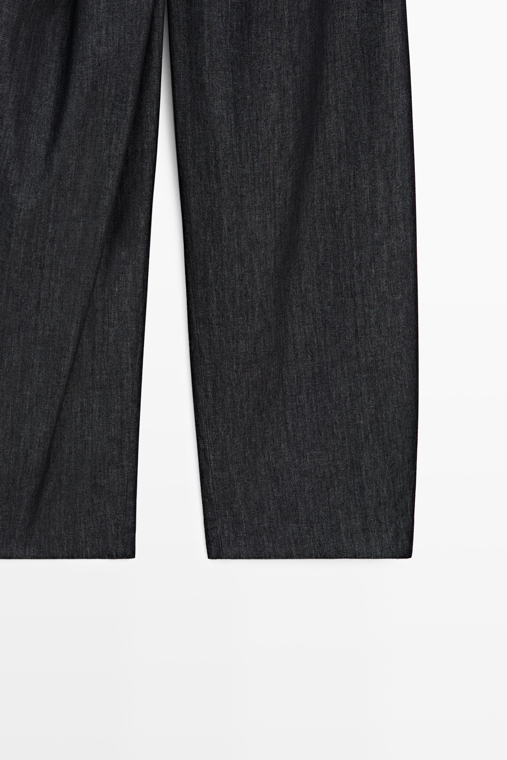 High-waist pants with crossover detail