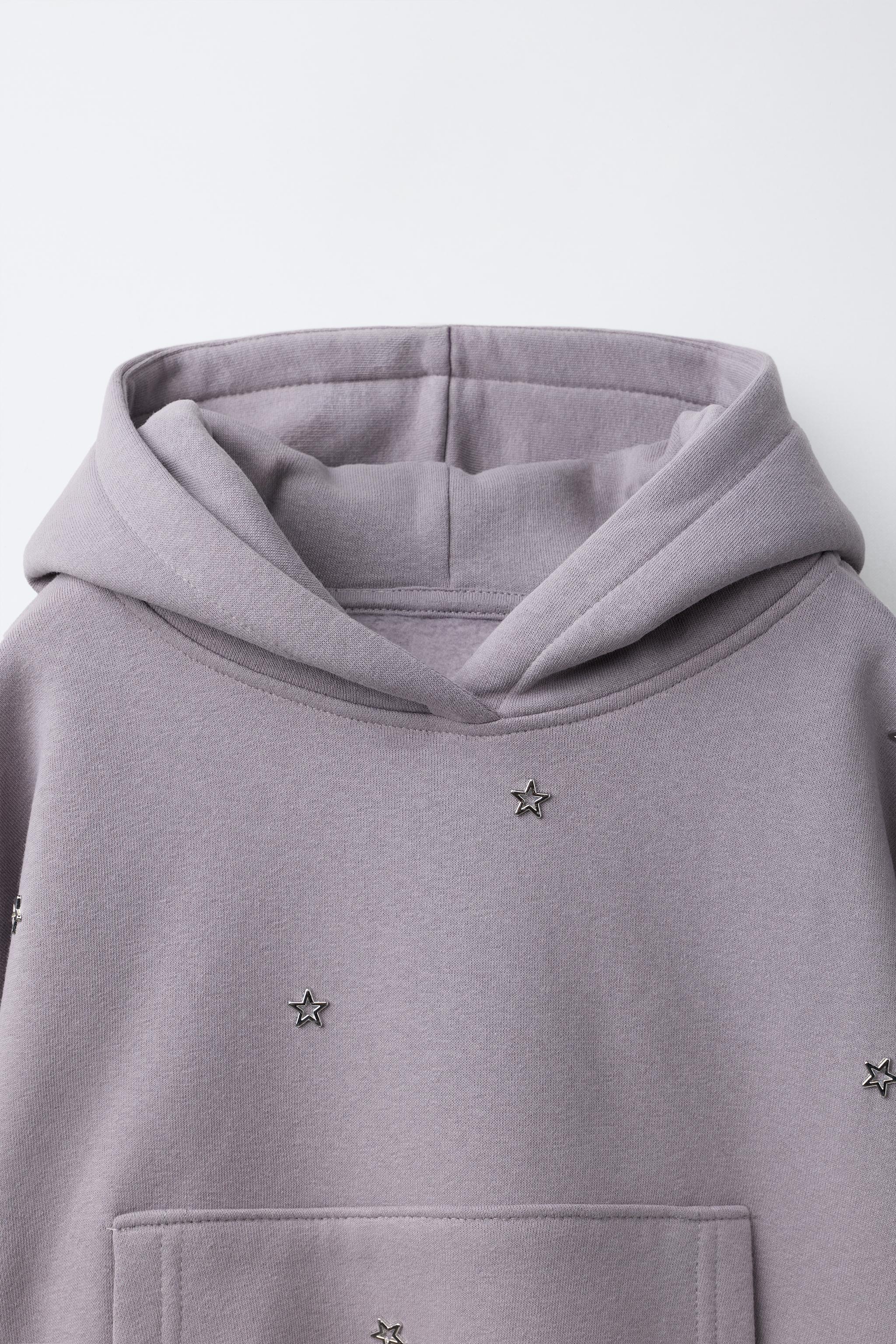 SWEAT À CAPUCHE CLOUS ÉTOILES