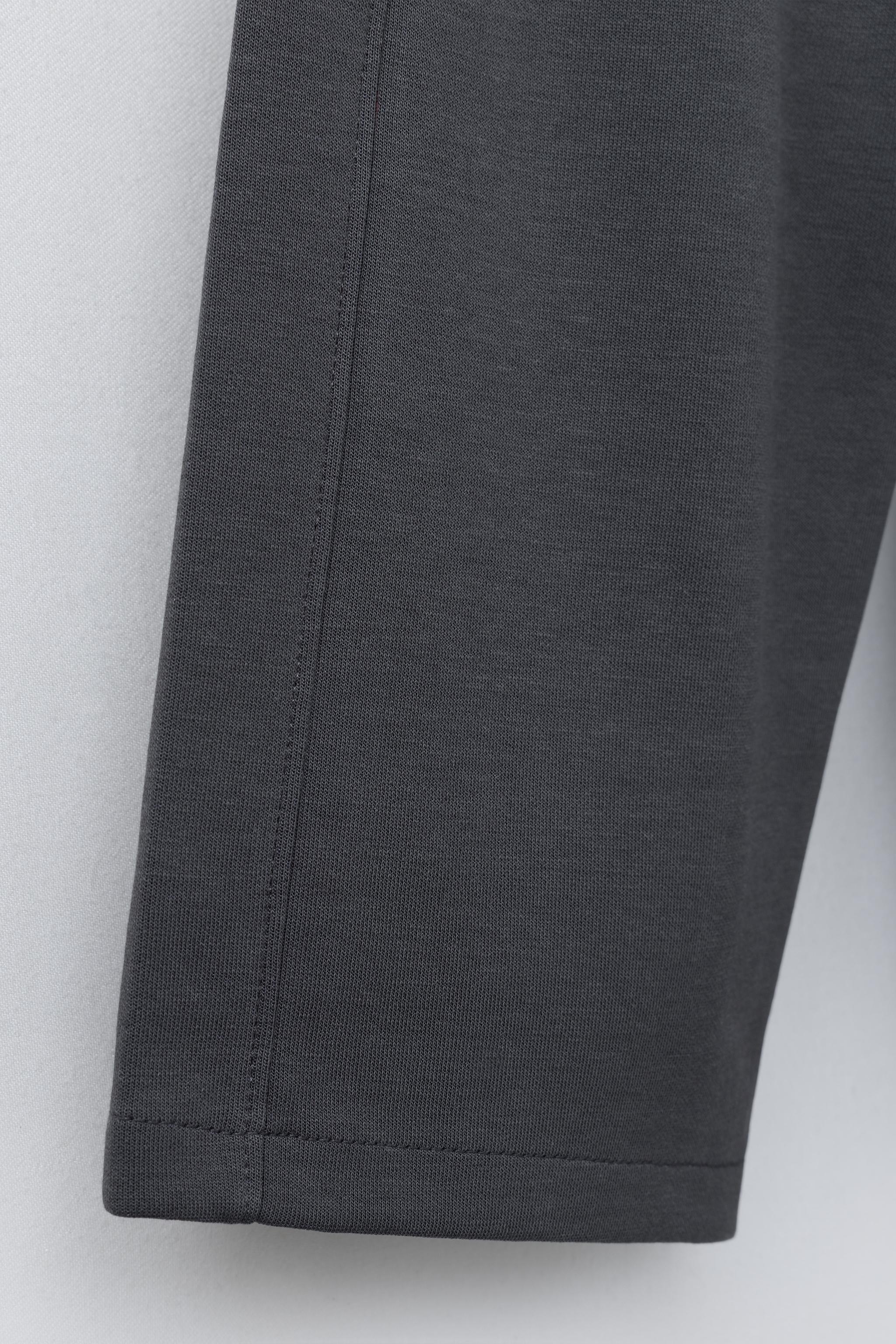 PANTALON WIDE LEG INTERLOCK INSCRIPTION EN RELIEF