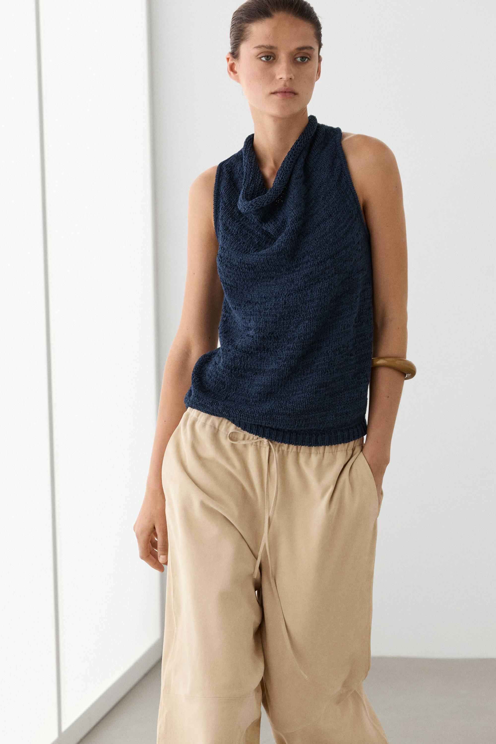 Knit top with draped neckline