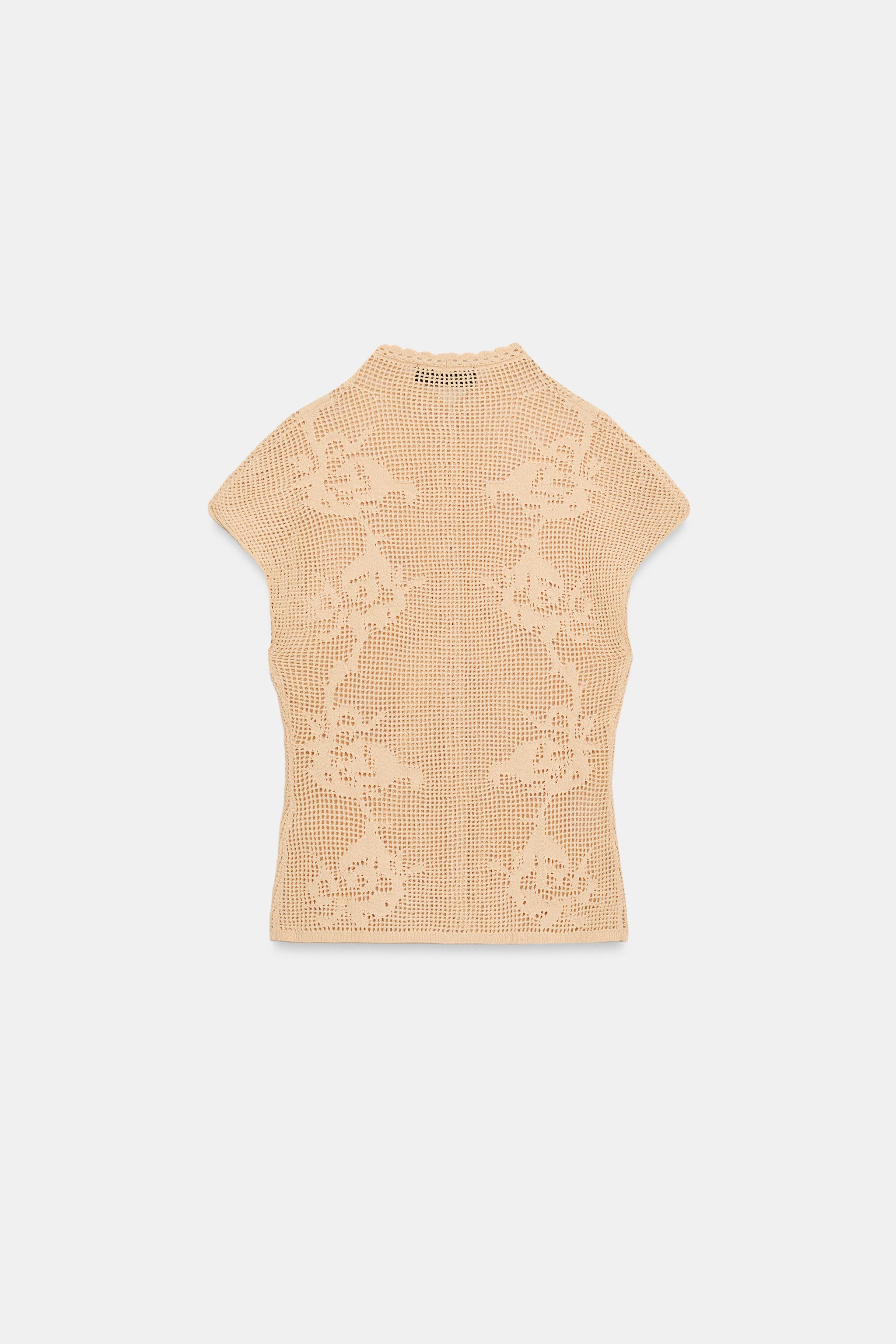 TOP EN MAILLE POINTELLE