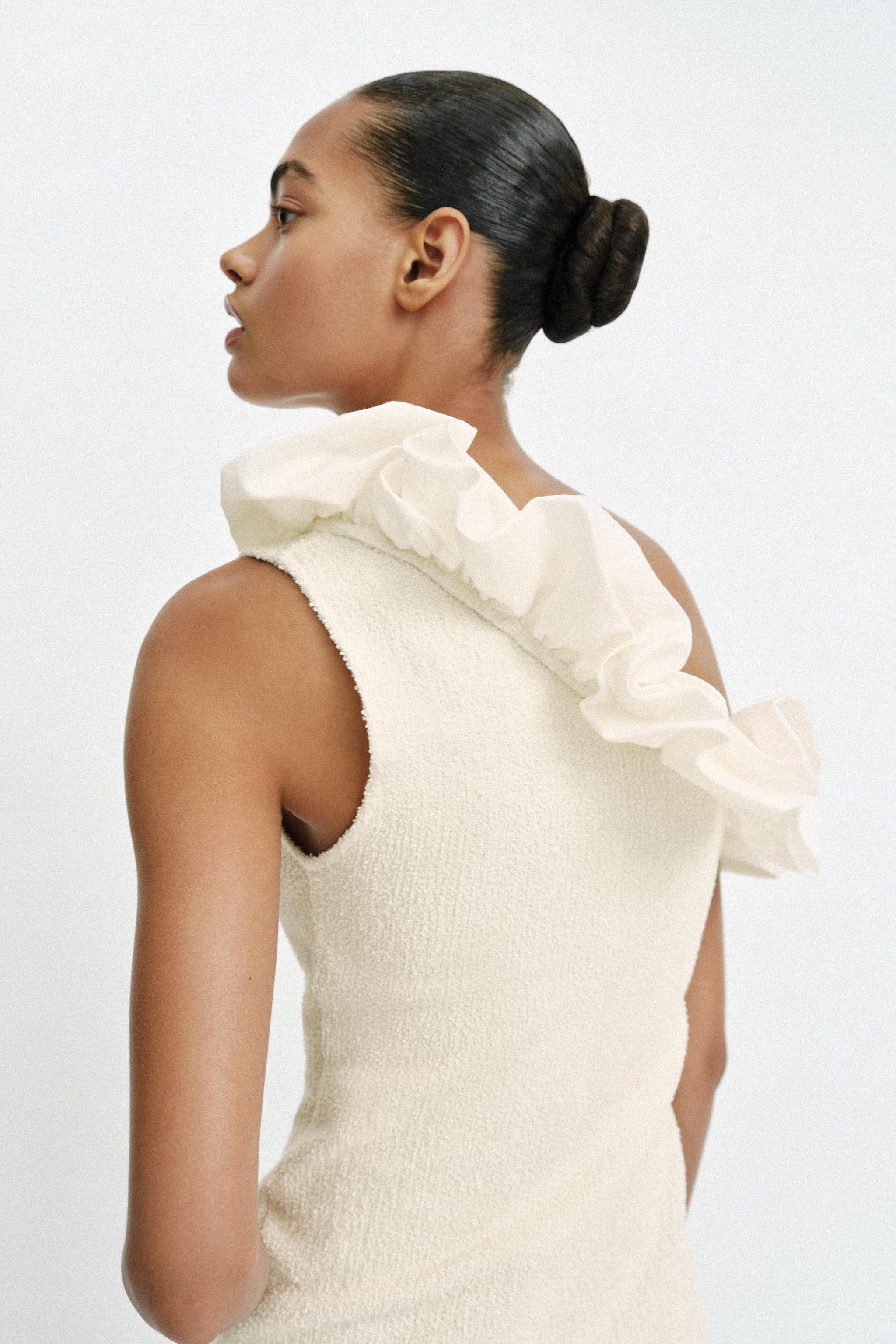 ASYMMETRIC BOUCLÉ TOP