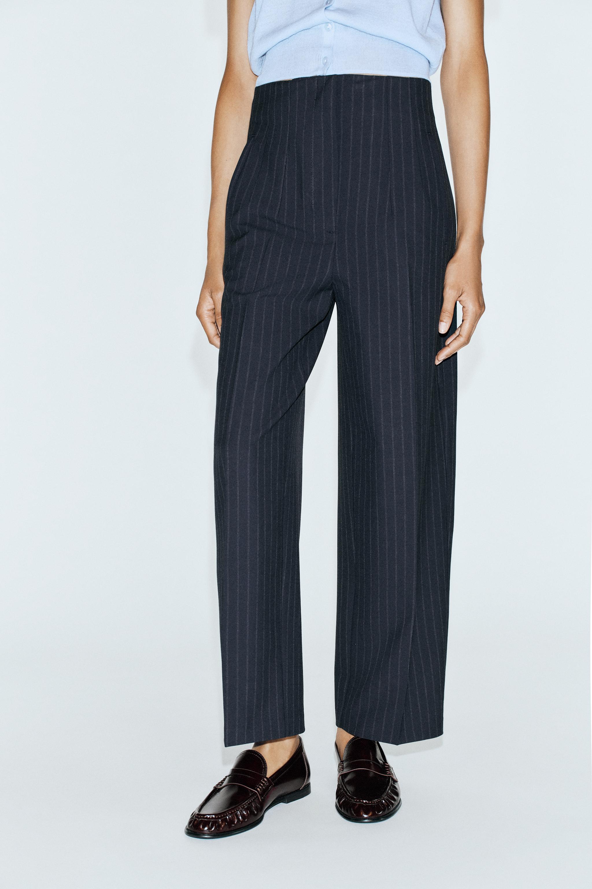 HIGH-RISE BARREL-LEG PANTS