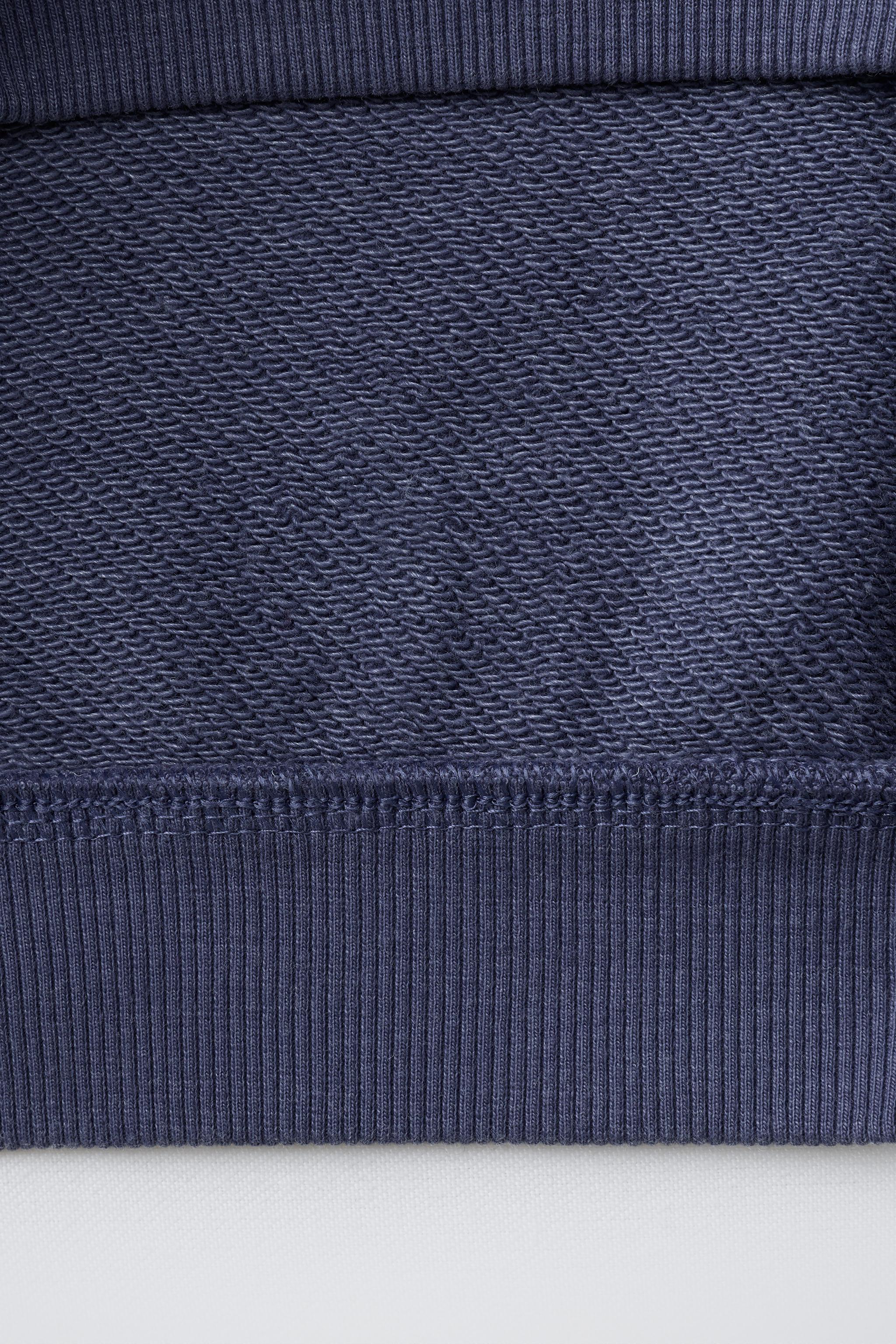 SWEAT AVEC INSCRIPTION IMPRIMÉE