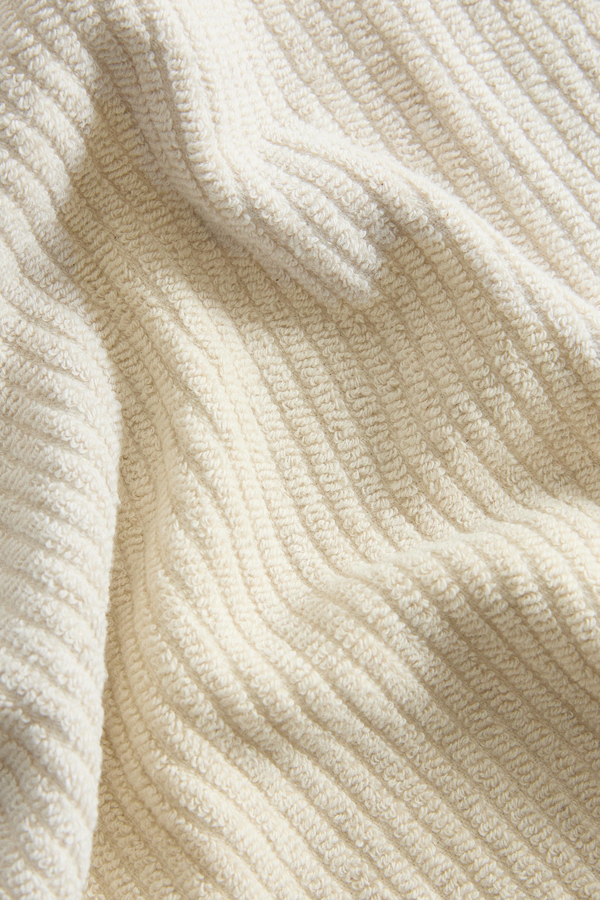 TEXTURED BATH TOWEL