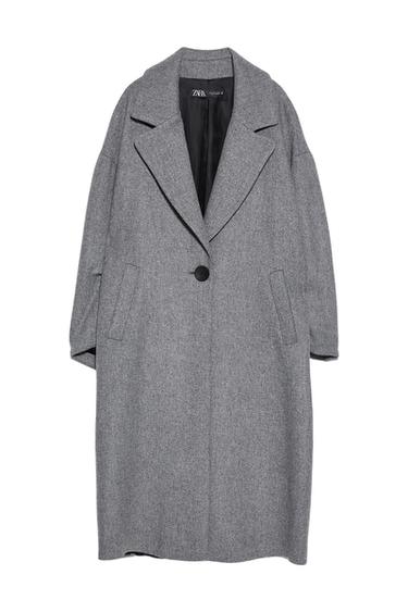 Front view of a grey coat with a wide lapel and one button, side pockets