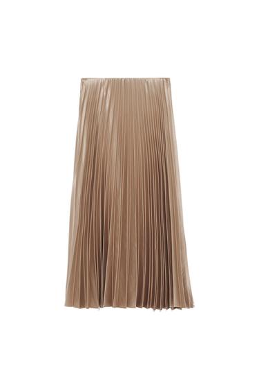 Beige pleated skirt on a white background, showcasing an elegant and flowing design.
