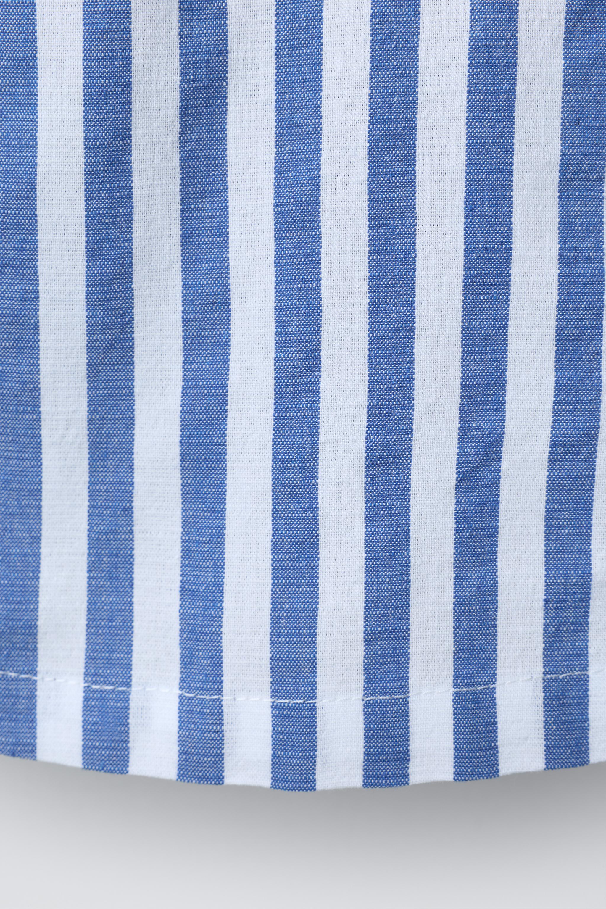 STRIPED DRESS WITH PIPING