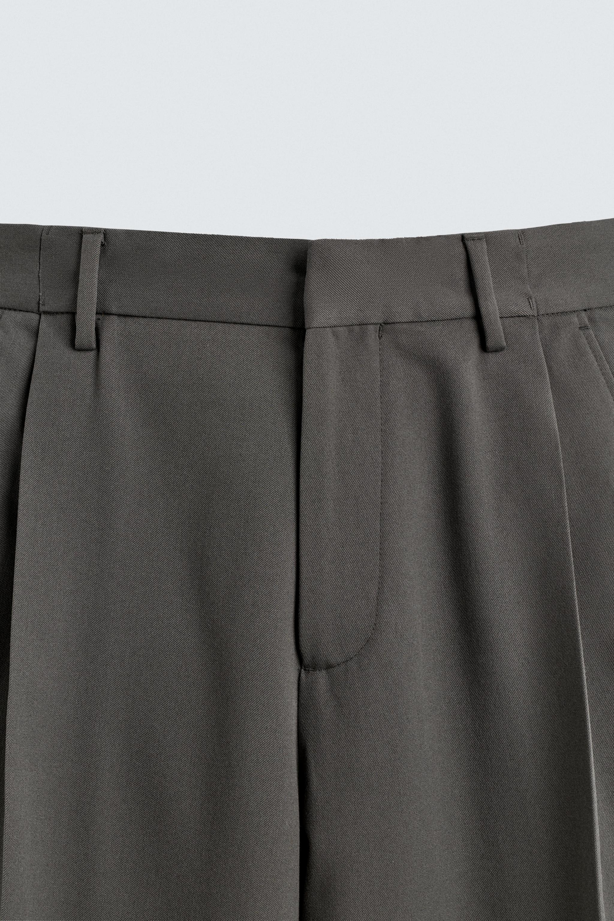 PLEATED WIDE FIT PANTS