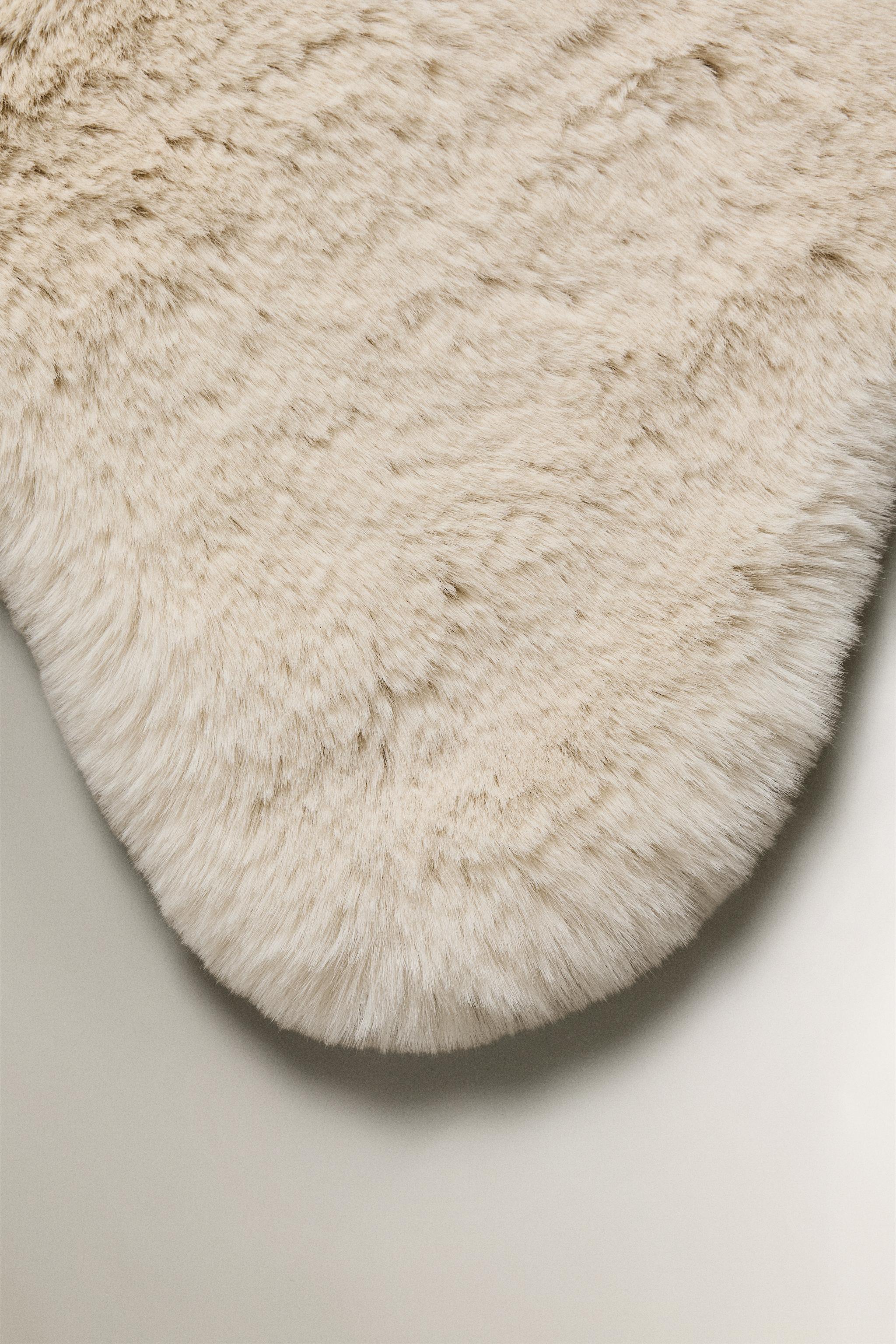 SMALL IRREGULAR FAUX FUR AREA RUG — Ecru